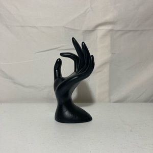 Black ring accessories hand. ring holder or decor.